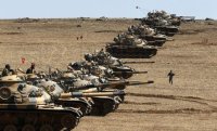 تركيا تحشد قواتها لشن عملية في عفرين السورية