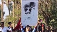 العراق.. فصل طلبة رفعوا صورة صدام حسين