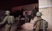اعتقال 11 فلسطينيا بالضفة الغربية