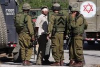 اعتقال 21 فلسطينيا