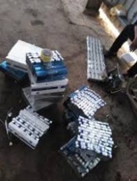 ضبط 1394 كروز دخان مهرب و 125 علبة جوس عبر معبر جابر