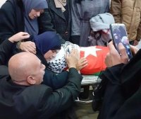 جثمان الشهيد أبو دياك يوارى الثرى في عمان (صور وفيديو)