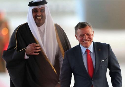 الملك يهنئ الشيخ تميم