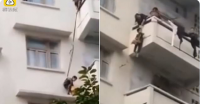 مسنة تخاطر بحفيدها لإنقاذ قطتها (فيديو)