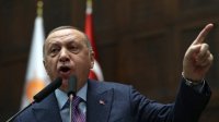 أردوغان يتوعد برد "قوي" على سورية