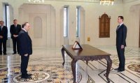 الأسد يعفي رئيس الوزراء من منصبه