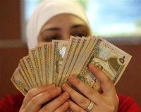 صرف أجور العاملين في امتحان التوجيهي الثلاثاء