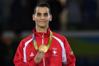 السجن 6 أشهر للبطل الأولمبي أبو غوش