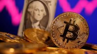 "بيتكوين" تنخفض 10% وتتراجع إلى 48 ألف دولار