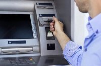 المعونة يدعو المنتفعين لاستخراج بطاقات الصراف الآلي