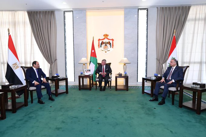 الملك: واجبنا تقوية جسور التعاون بين الأردن ومصر والعراق (صور)