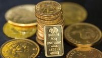 الذهب يتراجع عن أعلى مستوى منذ أكثر من 5 أشهر