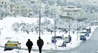 زخات ثلجية خفيفة فوق المرتفعات العالية