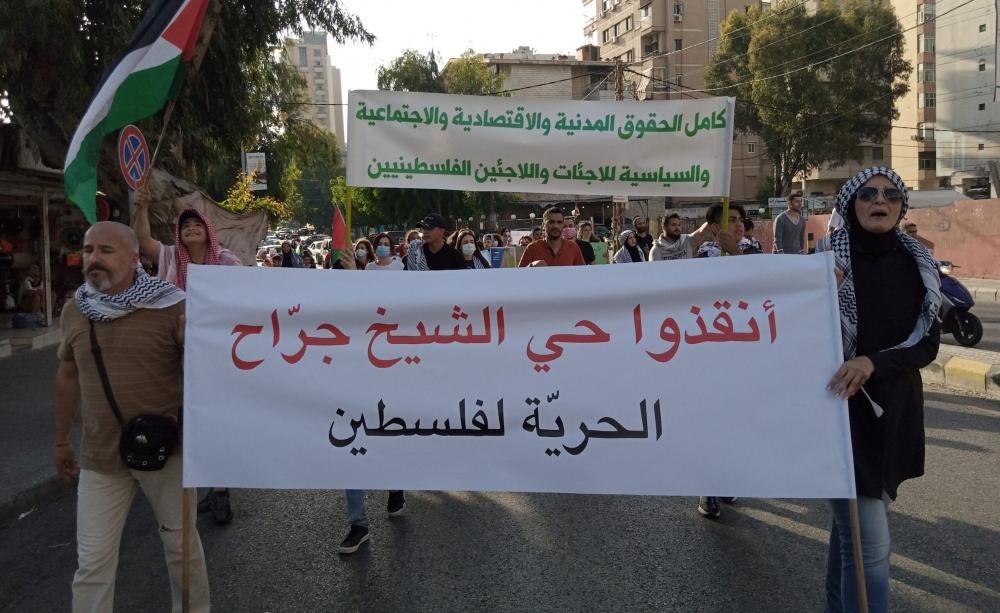 نشطاء سلام يتظاهرون بالشيخ جراح رفضًا لتهجير سكانه