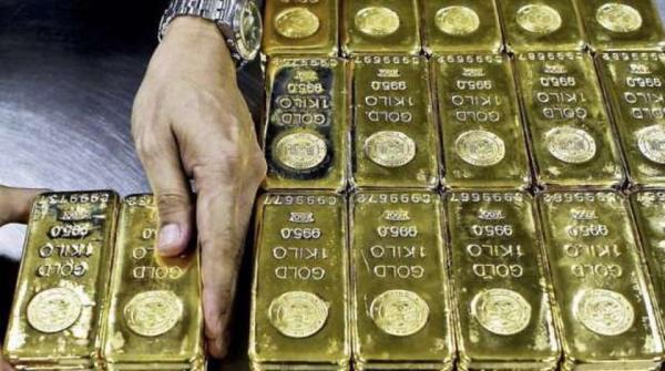 الذهب يشهد تقلبات سعرية متأثرا بارتفاع الدولار