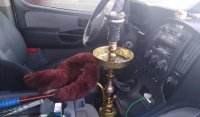 ضبط سائق يدخن الأرجيلة أثناء المسير على طريق إربد