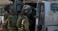 الاحتلال يعتقل 14 فلسطينيا بالضفة الغربية