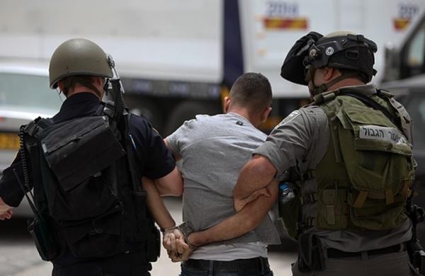 بالاسماء.. الاحتلال يعتقل 15 فلسطينيا من المغير شرق رام الله