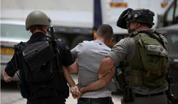 الاحتلال يعتقل 14 فلسطينيا في الضفة