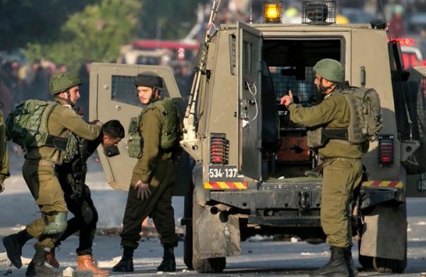 إصابات في عقبة جبر والاحتلال يعتقل 19 فلسطينيا بالضفة