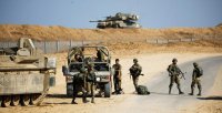 الجيش الإسرائيلي يعزز قواته على الحدود الشمالية متوعدا بالرد