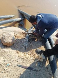 إزالة اعتداءات على مياه قناة الملك عبدالله بالشونة الجديدة