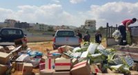 إتلاف مواد غذائية ومياه معدنية منتهية الصلاحية في معان