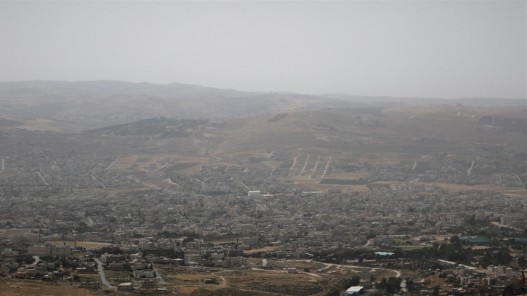 أجواء دافئة ومغبرة في أغلب المناطق اليوم