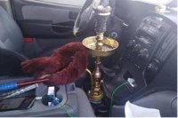 ضبط سائق عمومي يدخن "الأرجيلة" أثناء المسير