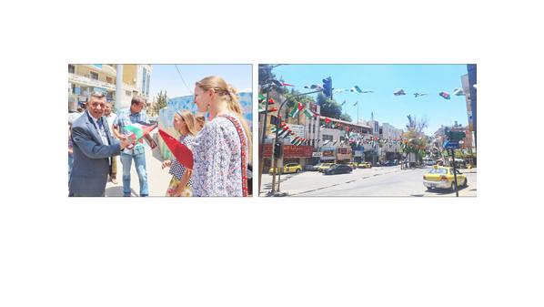 محافظات المملكة تتزين بالعلم الأردني وصور القائد احتفاء بعيد الاستقلال