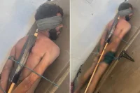 صورة صادمة تثير غضب العالم لأسير فلسطيني في قبضة جنود الاحتلال