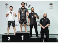 طالب جامعة عمان الأهلية (أمير العموش) يتوّج بطلاً للمملكة في الـ  MMA